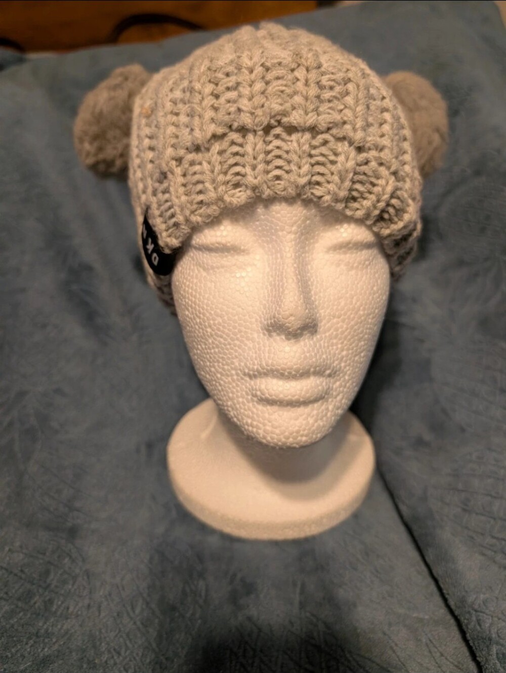 Title: DKNY Women's Double Pom-Pom Fleece-Lined Beanie Hat